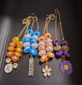 Bracelets - beaded with charm