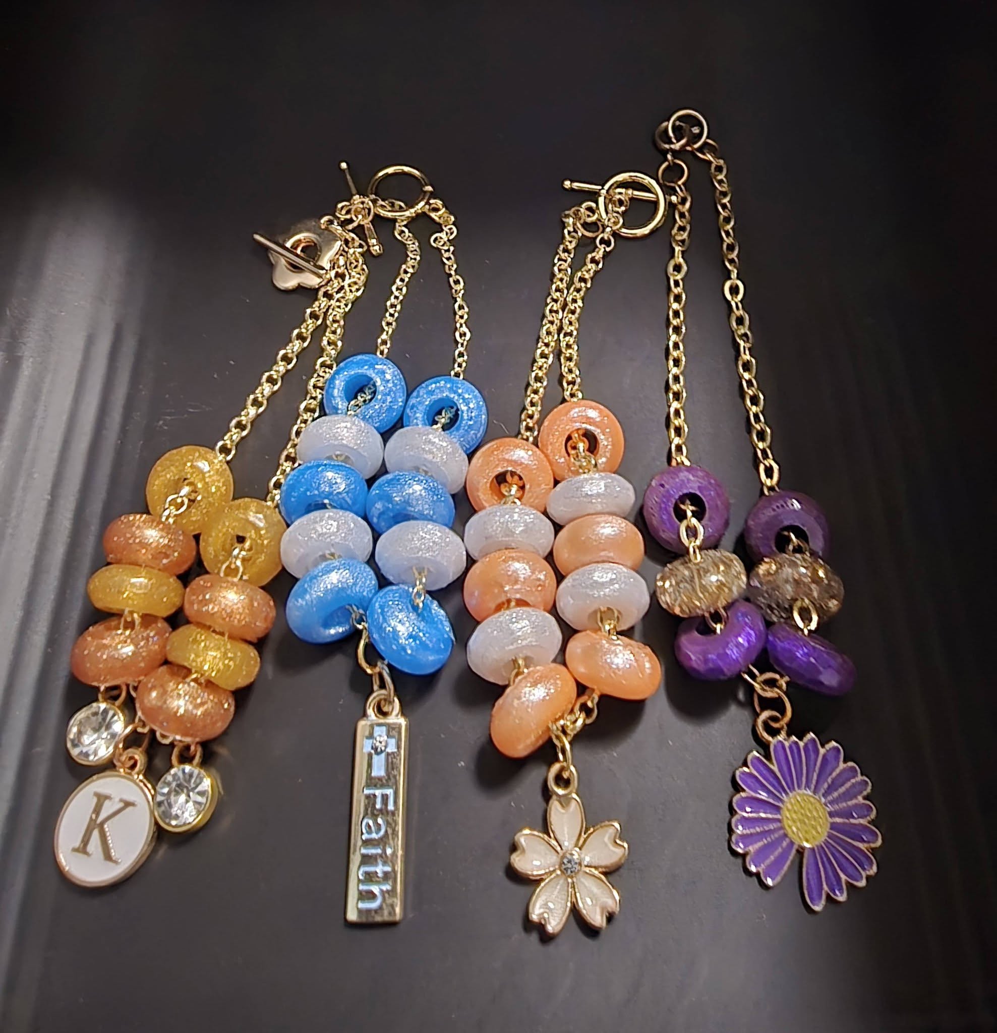 Bracelets - beaded with charm